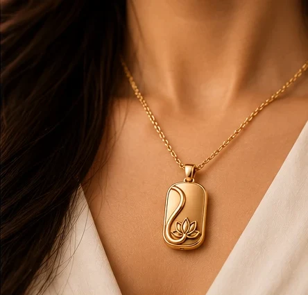A woman wearing a SaferSide Lotus pendant